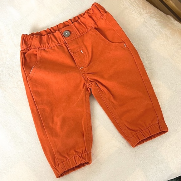 Offer $5 DONATING Deep Orange Baby Jeans 0/3 Mos. NWOT 🎉 Host Pick 🎉 - Picture 1 of 6